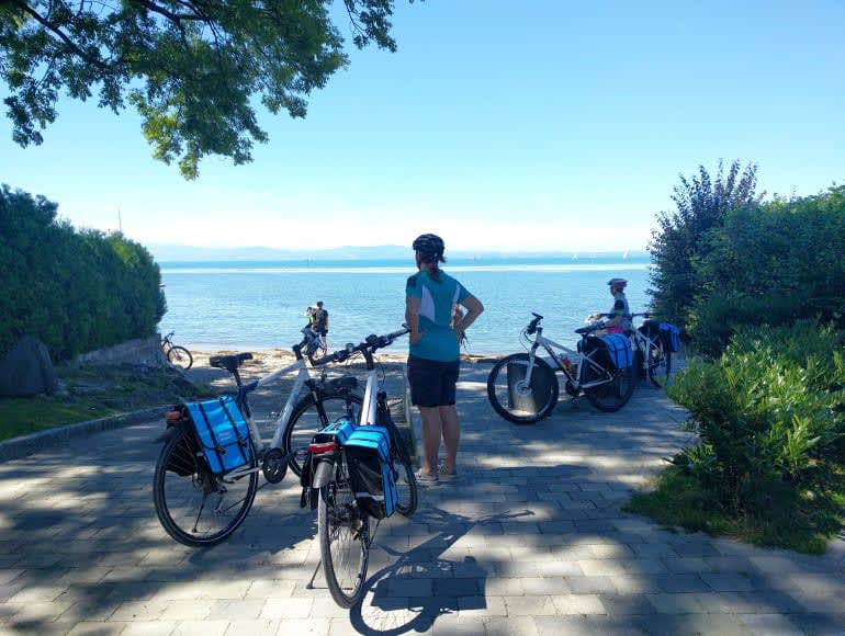 Cycling next to river beach 
